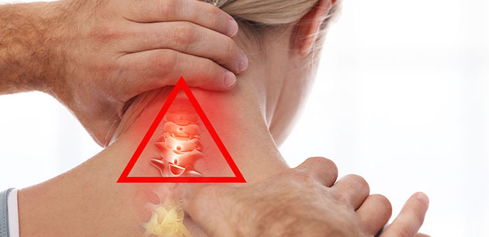 Cleveland chiropractor adjusting woman's neck for whiplash