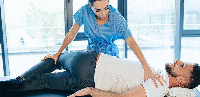 Patient receiving sciatica treatment from Cleveland chiropractor