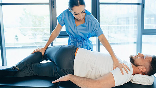 Patient receiving sciatica treatment from Cleveland chiropractor